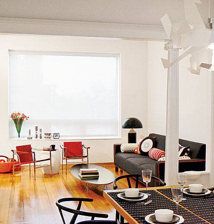A living room decorated in black, white, and red