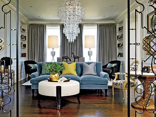A room decorated in various shades of blues and grays