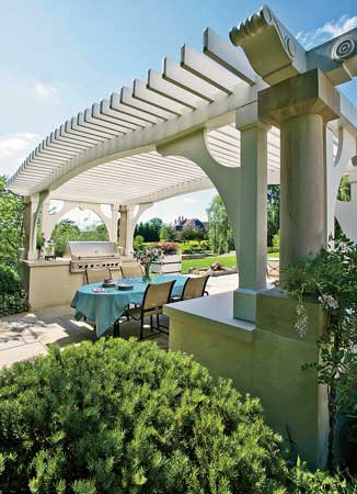 An outdoor kitchen is designed for garden-to-table alfresco dining.