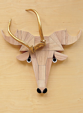 Gold-painted antlers and rubber-wood puzzle