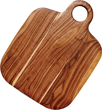 Hand-carved wooden serving board from Ashes & Milk