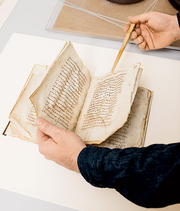 Repairing a handwritten codex, over 1,000 years old