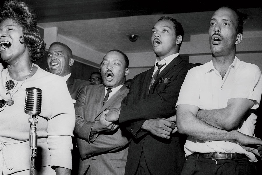 King with Mahalia Jackson, Jesse Jackson, and Al Raby at the New Friendship Baptist Church on August 4, 1966