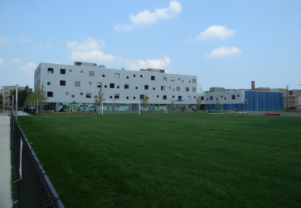 Back of the school, with soccer field and playground.
