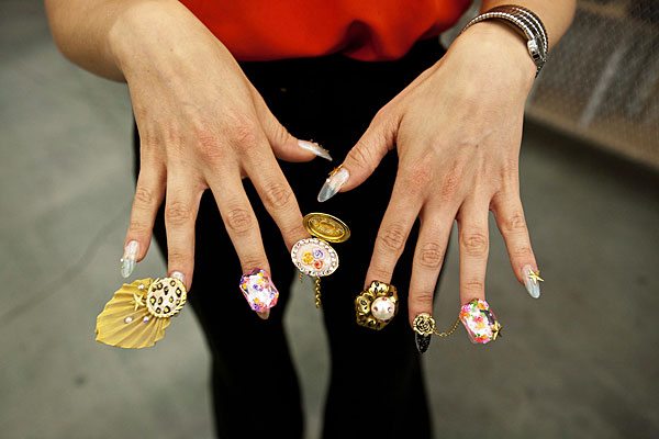 A woman's elaborately decorated nails