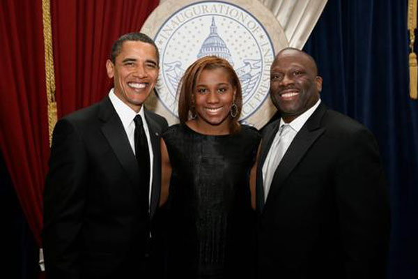 Les Coney, right, with his daughter and President Obama