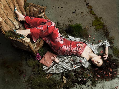 a woman poses in a floral dress from Luca Luca in Chicago