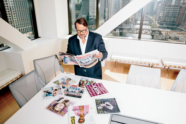 Michael Ferro with some of Wrapports's publications