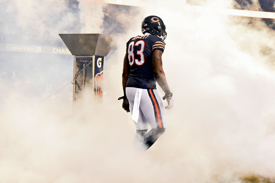 Bennett entering the football field