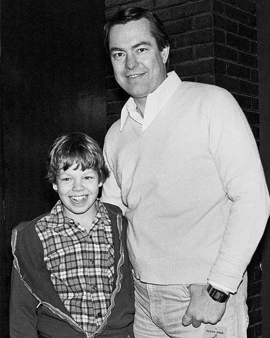 Bill Kurtis with his son