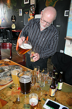 Randy Mosher pouring a beer