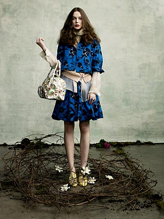 a woman models a floral dress from Chicago's Nordstrom store