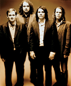 Wilco circa 1997: (from left) John Stirratt, Ken Coomer, Jeff Tweedy, and Bennett