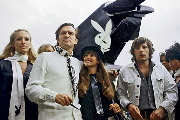 Hugh Hefner, in Paris in 1970, with his then-girlfriend Barbi Benton and the movie director Roman Polanski