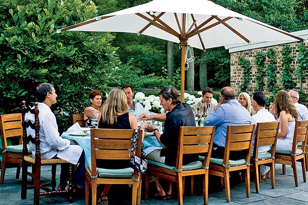 The chef (at left) presides over a seven-course classic French summertime feast, complete with wine pairings.