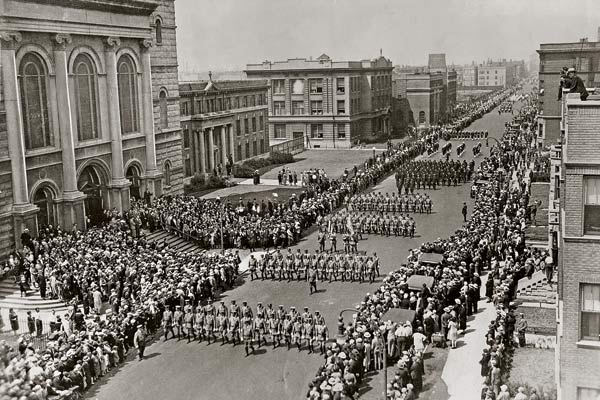 Lingle’s funeral parade proceeds past Our Lady of Sorrows on West Jackson Boulevard.