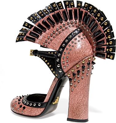PRADA pink leather heels with fringe and stud details ($1,800), similar styles at Prada, 30 East Oak Street.