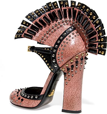 PRADA pink leather heels with fringe and stud details ($1,800), similar styles at Prada, 30 East Oak Street.
