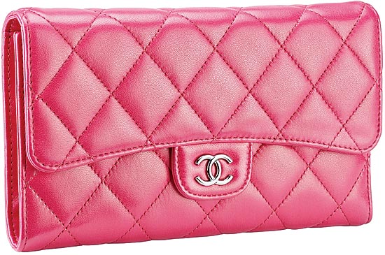 CHANEL pink lambskin and metal wallet ($915), at Chanel, 935 North Michigan Avenue.