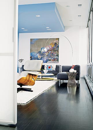 Sky-blue paint overhead helps to define a seating area in a high-rise condo designed by Patrizio Fradiani of Studio F Design.