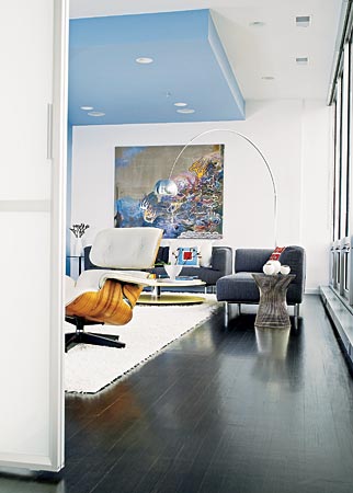 Sky-blue paint overhead helps to define a seating area in a high-rise condo designed by Patrizio Fradiani of Studio F Design.