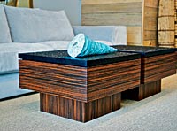coffee tables with Italian ebony bases and hand-chiseled American walnut wavy tops, $6,500 for the pair