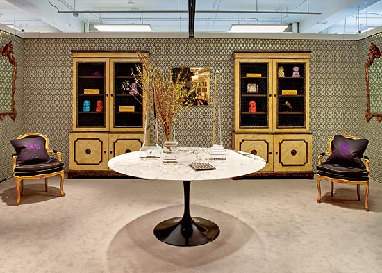 Jagmin put together a sophisticated yet fun entryway, combining the youthful pop of David Hicks’s Hexagon wallpaper and a mid-century Saarinen table with traditional Louis XV–style chairs and 18th-century Italian faux-marble cabinets. To be playful, he put different-colored Buddhas (standing for peace, hope, and prosperity) on the shelves—a welcoming touch.