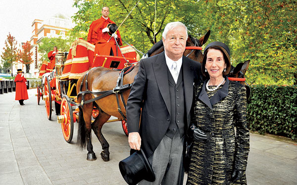 Susman with his wife, Marjorie, on the day of his ceremonial induction last October at Buckingham Palace