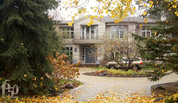 Julius Pepper's new contemporary home with circular stone driveway.