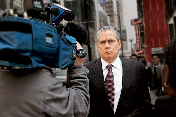 Christopher Kelly leaves the Dirksen Federal Building last April after being arraigned on racketeering and extortion charges related to the indictment of Governor Rod Blagojevich.