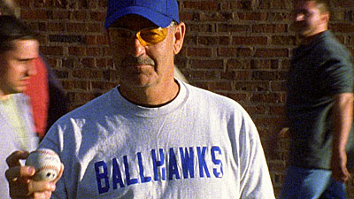 A Ballhawks member holding a baseball.