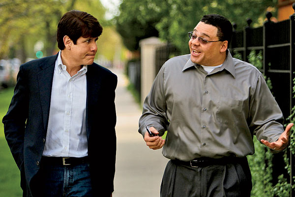 Adam (right) with Blagojevich after the former governor challenged U.S. Attorney Patrick Fitzgerald to be “man enough” to face him in court