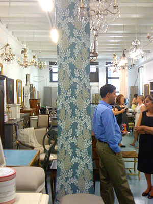 People standing in Ashley & Sloane showroom