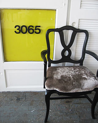 Yellow door and vintage chair