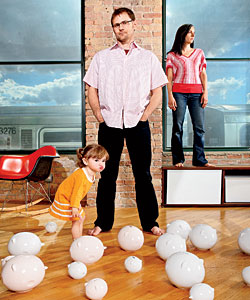 Bruce and Stephanie Tharp, the duo behind Materious, with their daughter, Isla