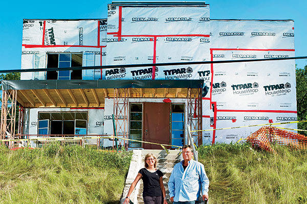 Charlotte and Christoph Lichtenfeld in front of their work in progress, the Armco-Ferro House
