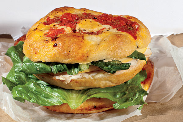 Smoked turkey sandwich on a tomato focaccia bun from City Provisions Deli
