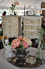 Antique furniture, serving tray, flowers, and statuettes