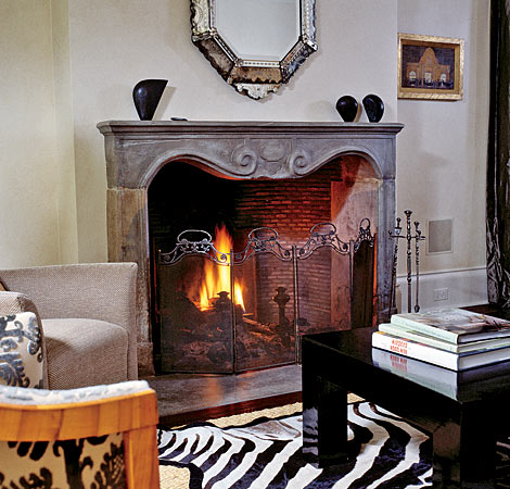 Turn-of-the-century English mahogany mantel with marquetry and mirror