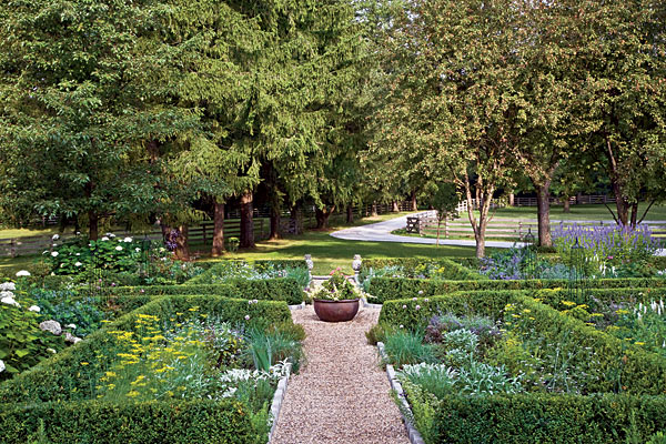 A full shot of Tracy Pollina's lush garden