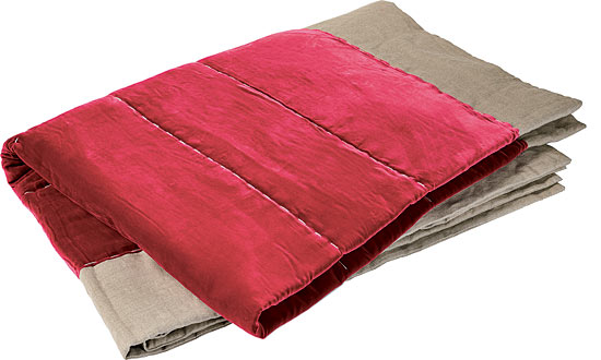 Natural linen trim pairs unexpectedly with hot-pink cotton velvet in a 71-by-99-inch blanket