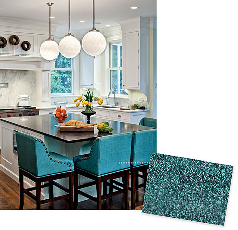 A kitchen, decorated in turquoise and white
