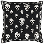 A pillow decorated with a skull print