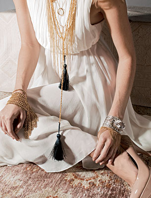 NECK: David Yurman Infinity open pendant, Elements fringe necklaces, and Damen + Division vintage fringe tassel necklace. LEFT ARM: Sandra Dini cuff, and Elements fringe bracelet, RIGHT ARM: Damen + Division vintage fringe chain bracelet