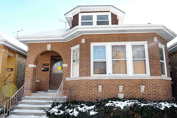 A foreclosed Chicago bungalow, currently being rehabbed by Christian and Nicole Hawkenson