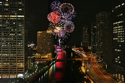 A fireworks display over the Chicago River