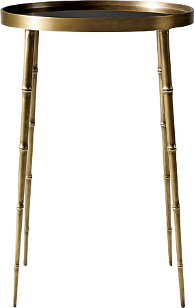 Coco 23-inch accent table with tapered faux-bamboo legs, an antique brass finish, and a smoked-glass top