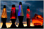 Colorful lava lamps on display outdoors