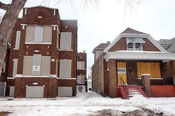 Boarded-up foreclosed homes in Chicago Lawn