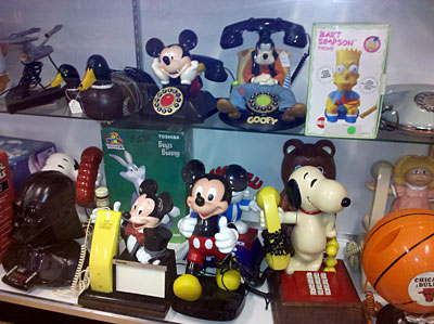 A display case littered with novelty phones